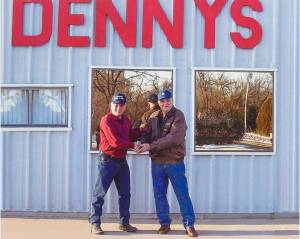 Hanna owner shaking hands with owner of Denny's Heating and Cooling upon purchasing this Newton shop in 2008 to become Hanna's third location
