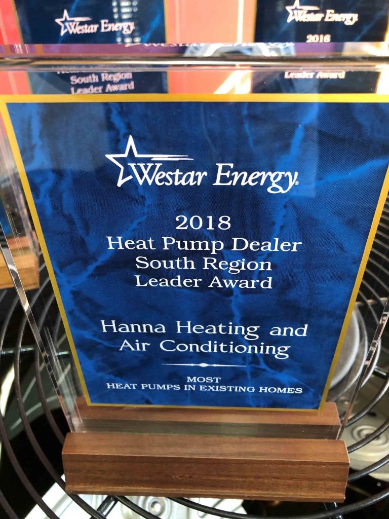 Picture of an award that Hanna Heating and Air won for most heat pumps in existing homes. Given to them by Westar Energy