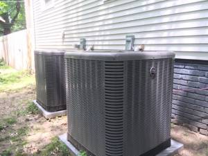 2 air conditioners installed at Wichita house to keep 2nd floor upstairs cool