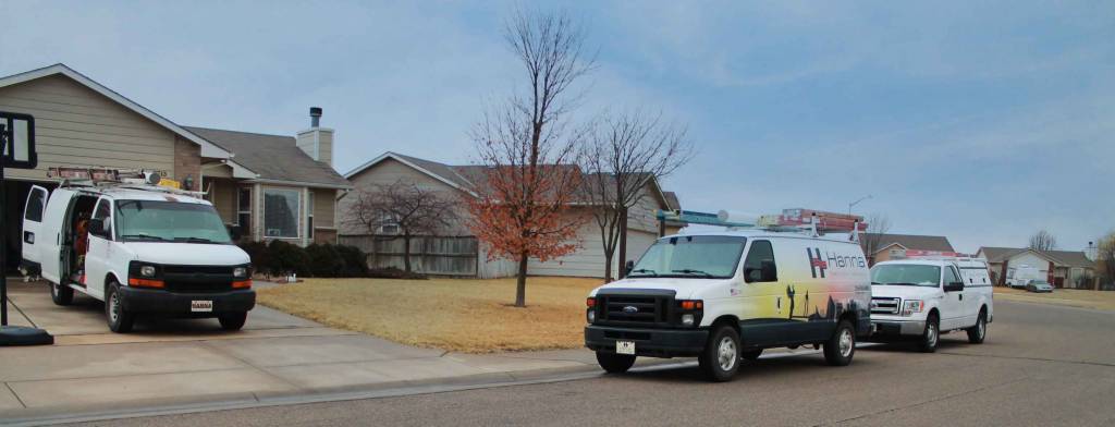 Hanna Heating and Air van installing air conditioning in a West Wichita home