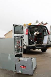 Hanna HVAC fan with broken furnace ready for winter in front of a Wichita home