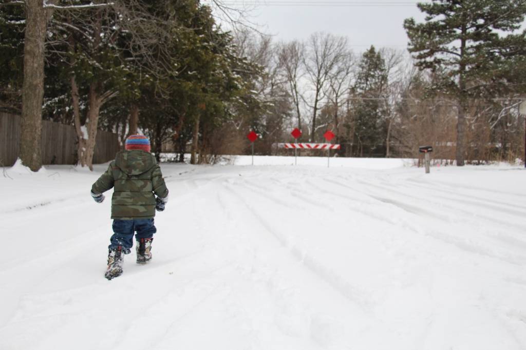 Child walking to bike path in east Wichita neighborhood